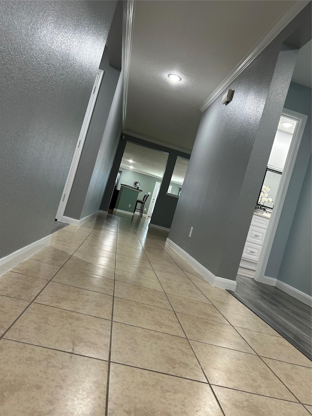 11618 Wren Crossing Dr, Houston, TX 77038 - hall featuring light tile patterned flooring and crown molding