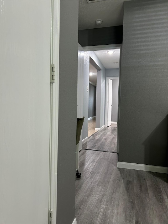 11618 Wren Crossing Dr, Houston, TX 77038 - hall with wood finished floors and baseboards