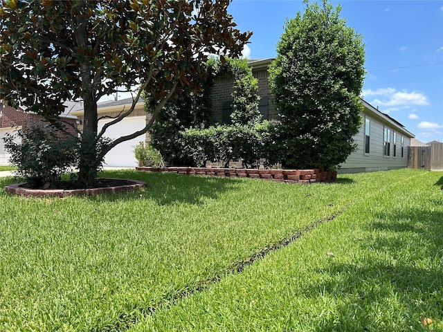 11618 Wren Crossing Dr, Houston, TX 77038 - view of yard with an attached garage