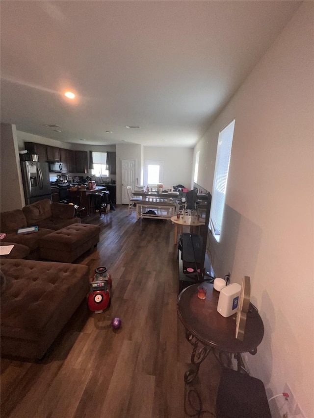 23830 Seeded Meadow Ct, Hockley, TX 77447 - living room featuring dark wood-style flooring