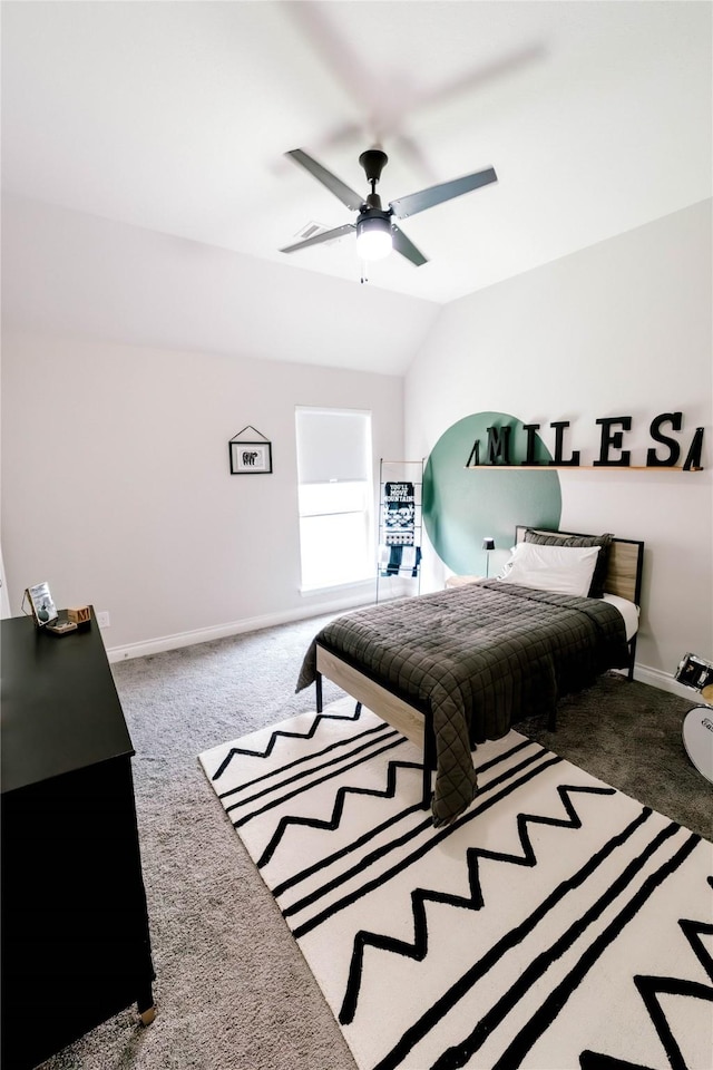 3319 Pleasant Hollow Ln, Houston, TX 77365 - carpeted bedroom with vaulted ceiling and ceiling fan