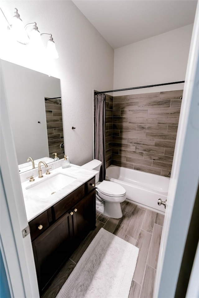 3319 Pleasant Hollow Ln, Houston, TX 77365 - full bathroom with vanity, shower / bath combo with shower curtain, and wood finish floors