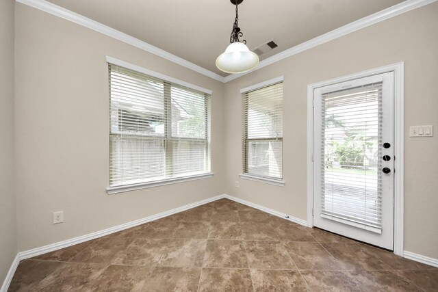 12131 Cove Ridge Ln, Cypress, TX 77433 - unfurnished dining area with crown molding and tile patterned flooring