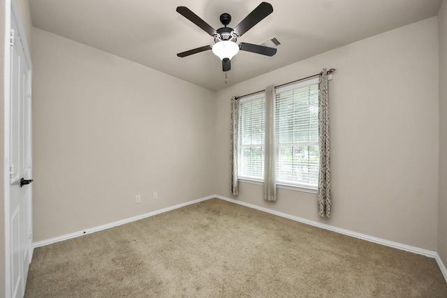 12131 Cove Ridge Ln, Cypress, TX 77433 - carpeted empty room with baseboards and a ceiling fan