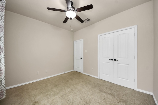 12131 Cove Ridge Ln, Cypress, TX 77433 - unfurnished bedroom featuring carpet floors, a closet, and ceiling fan