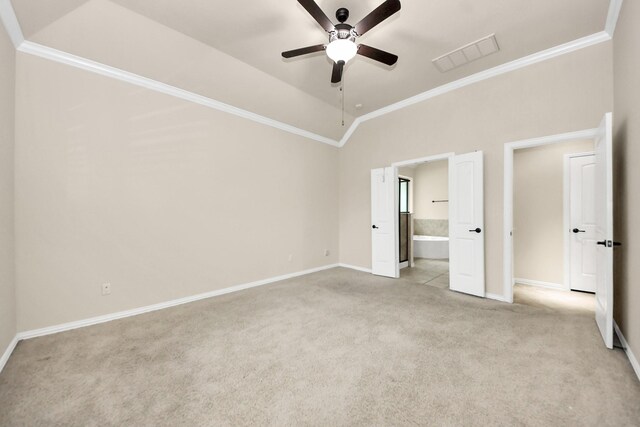 12131 Cove Ridge Ln, Cypress, TX 77433 - unfurnished bedroom with light carpet, ornamental molding, connected bathroom, vaulted ceiling, and a ceiling fan