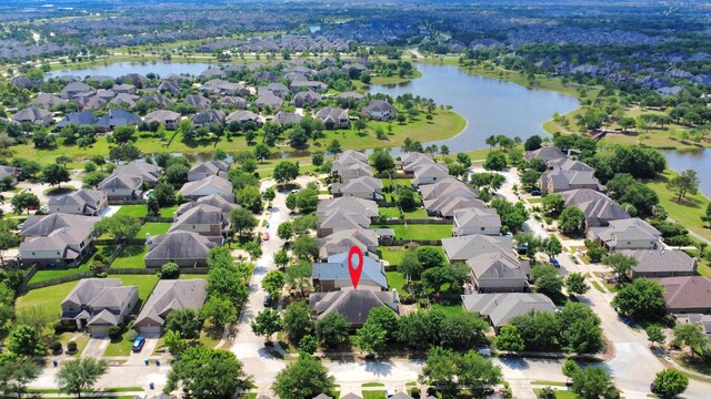 12131 Cove Ridge Ln, Cypress, TX 77433 - aerial perspective of suburban area with a large body of water
