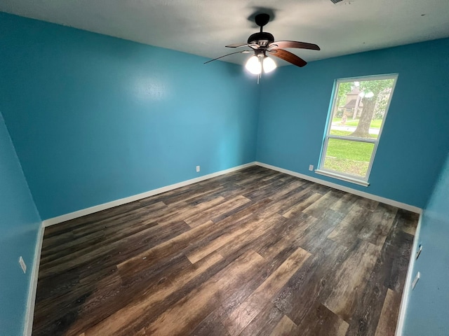 17506 Rustington Dr, Spring, TX 77379 - unfurnished room with dark wood finished floors and a ceiling fan