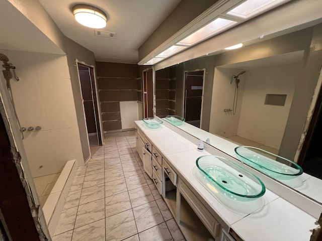 17506 Rustington Dr, Spring, TX 77379 - full bath with marble finish flooring, vanity, and a shower