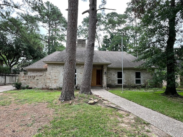 17506 Rustington Dr, Spring, TX 77379 - view of front of home featuring roof with shingles