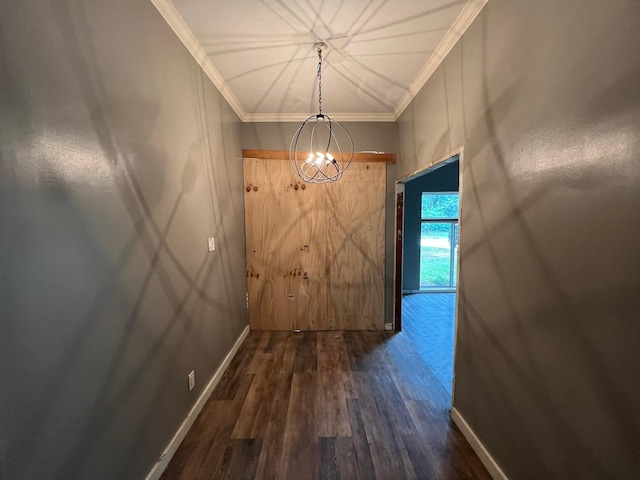 17506 Rustington Dr, Spring, TX 77379 - hall featuring wood finished floors, crown molding, and a chandelier