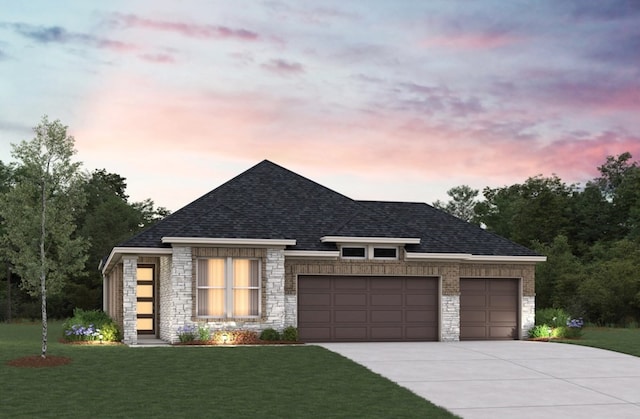 5603 Pearl Vista Dr, Katy, TX 77493 - view of front facade featuring stone siding, concrete driveway, a garage, and a front lawn