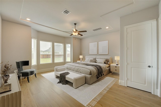 3242 N Upland St, Katy, TX 77493 - bedroom with light wood-style floors, recessed lighting, and ceiling fan