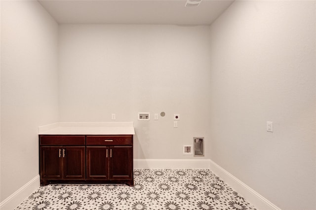 3242 N Upland St, Katy, TX 77493 - laundry area with hookup for an electric dryer, washer hookup, hookup for a gas dryer, and cabinet space