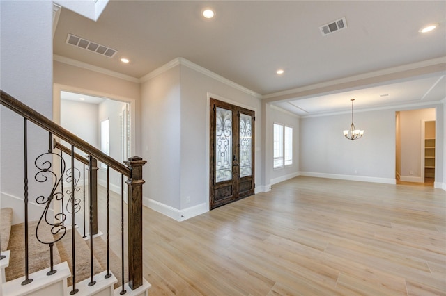 3242 N Upland St, Katy, TX 77493 - foyer with stairs, light wood-style flooring, a chandelier, crown molding, and recessed lighting