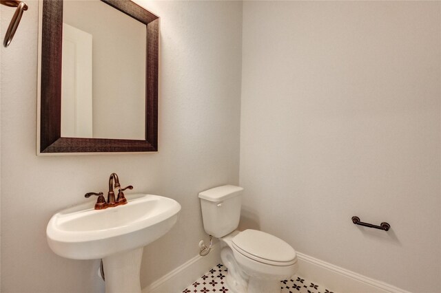 3242 N Upland St, Katy, TX 77493 - half bath featuring baseboards and toilet