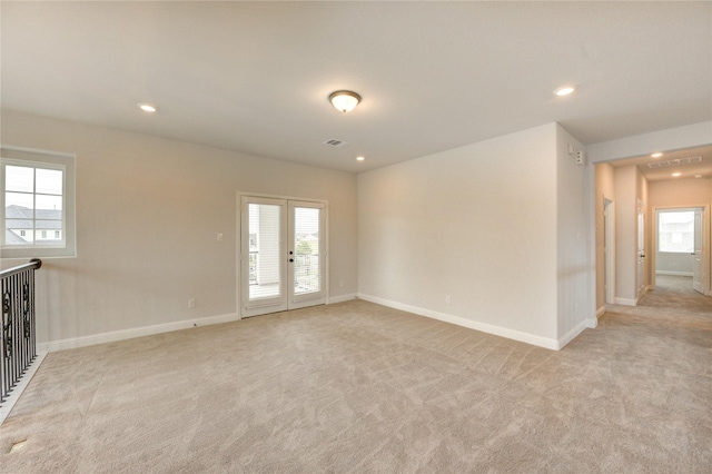 3242 N Upland St, Katy, TX 77493 - unfurnished room featuring light colored carpet, french doors, and recessed lighting