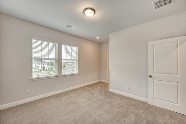 3242 N Upland St, Katy, TX 77493 - empty room featuring light colored carpet and recessed lighting