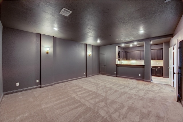 3242 N Upland St, Katy, TX 77493 - empty room with light colored carpet and a textured ceiling