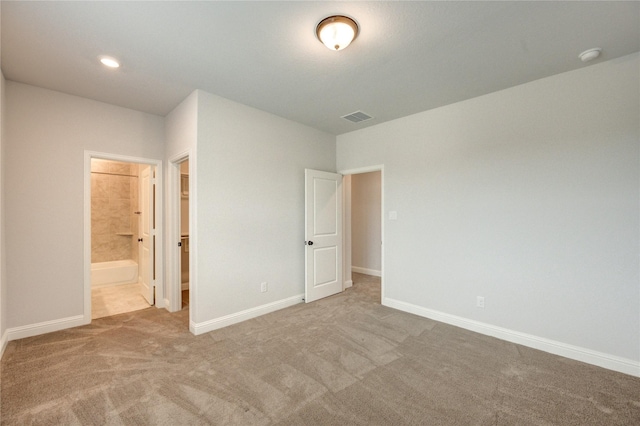 3242 N Upland St, Katy, TX 77493 - unfurnished bedroom featuring carpet floors and connected bathroom