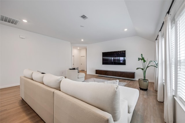 24107 Avocet Creek Rd, Katy, TX 77493 - living area featuring light wood-style floors, recessed lighting, and lofted ceiling