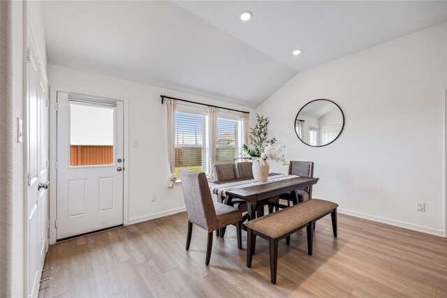 24107 Avocet Creek Rd, Katy, TX 77493 - dining area with lofted ceiling, light wood-style floors, and recessed lighting