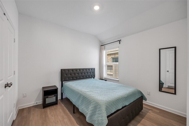 24107 Avocet Creek Rd, Katy, TX 77493 - bedroom with lofted ceiling, wood finished floors, and recessed lighting