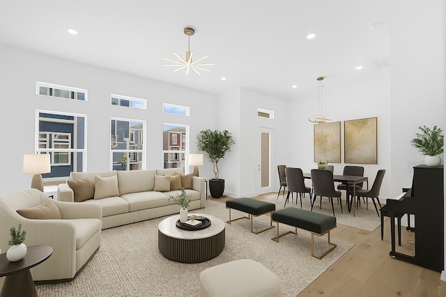 2122 Oatfield Dr, Houston, TX 77018 - living area featuring light wood-style flooring, recessed lighting, a chandelier, and a high ceiling