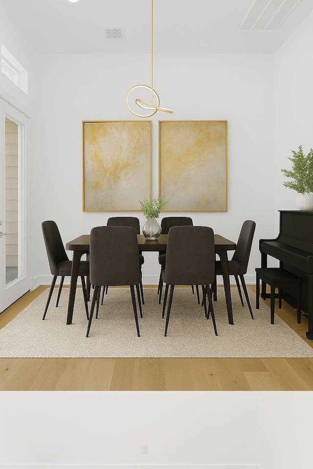 2122 Oatfield Dr, Houston, TX 77018 - dining space with wood finished floors and a chandelier