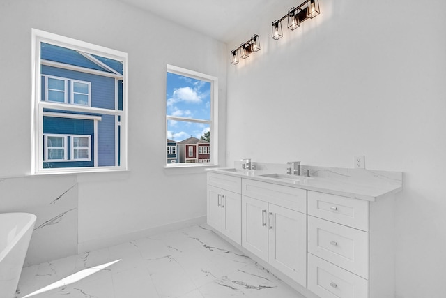 2122 Oatfield Dr, Houston, TX 77018 - full bath featuring a soaking tub, marble look tile flooring, and double vanity