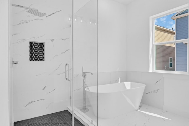 2122 Oatfield Dr, Houston, TX 77018 - full bathroom featuring a soaking tub, a marble finish shower, and marble finish flooring
