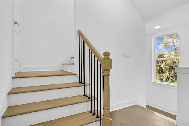 2122 Oatfield Dr, Houston, TX 77018 - stairs featuring wood-type flooring, recessed lighting, and lofted ceiling
