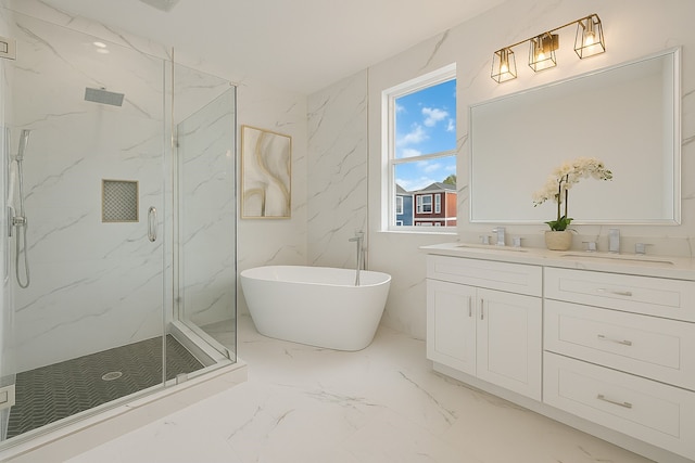 2122 Oatfield Dr, Houston, TX 77018 - full bathroom with marble tiled floors, a marble finish shower, a soaking tub, and double vanity