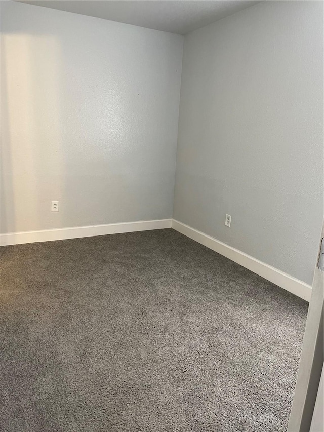 8703 Victorian Village Dr Unit 8703, Houston, TX 77071 - unfurnished room featuring dark colored carpet