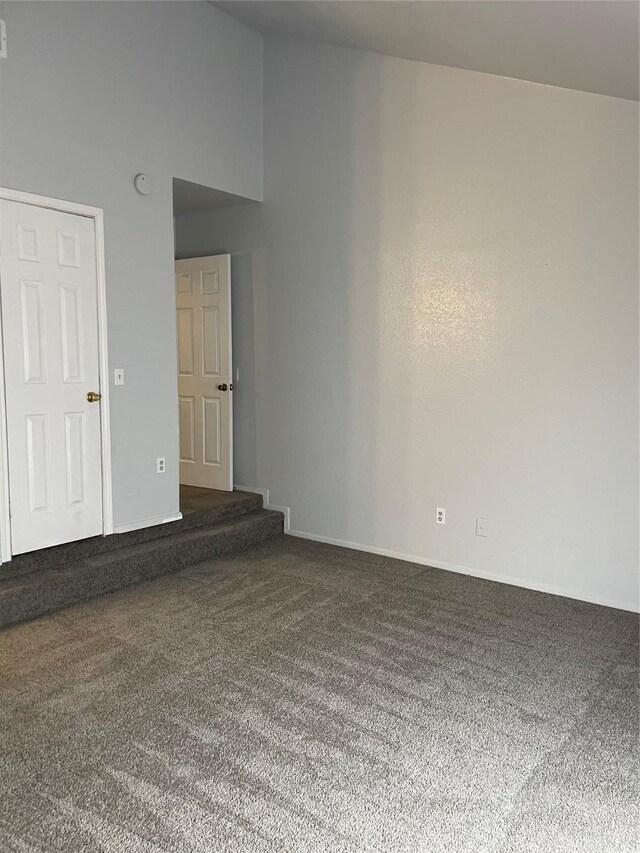 8703 Victorian Village Dr Unit 8703, Houston, TX 77071 - carpeted spare room with a towering ceiling and baseboards