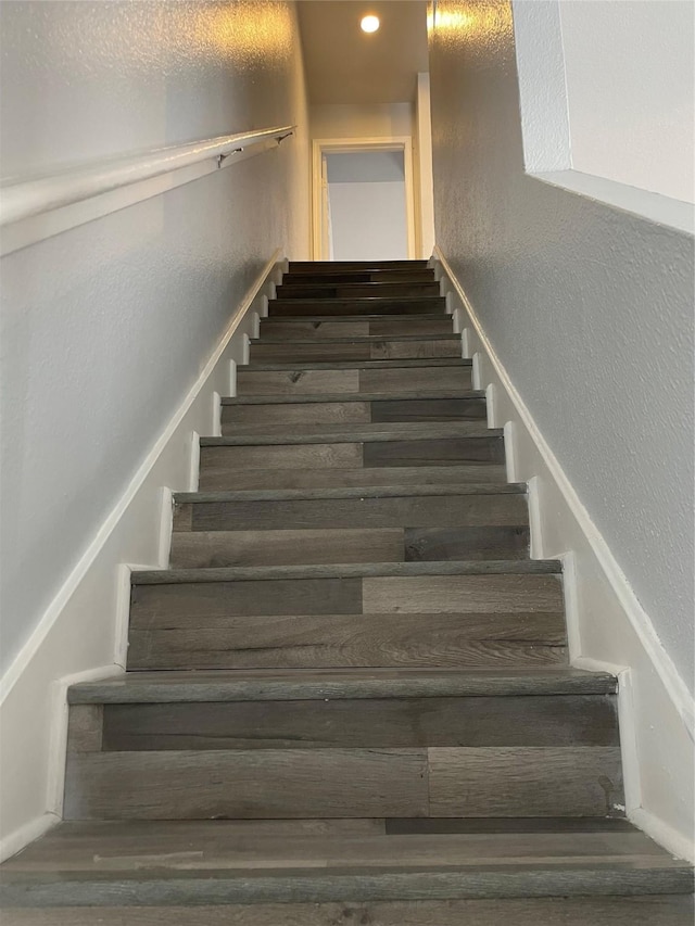 8703 Victorian Village Dr Unit 8703, Houston, TX 77071 - stairway featuring a textured wall