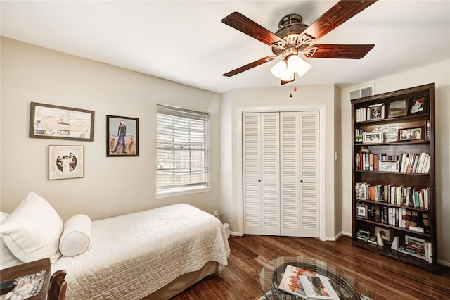 2602 Briarbrook Dr, Houston, TX 77042 - bedroom with wood finished floors, a closet, and a ceiling fan