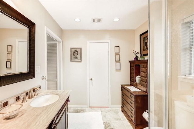 2602 Briarbrook Dr, Houston, TX 77042 - full bathroom featuring vanity, recessed lighting, and a shower