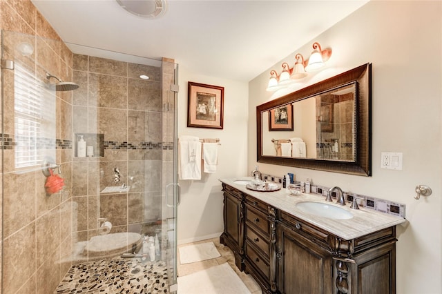 2602 Briarbrook Dr, Houston, TX 77042 - full bathroom with double vanity and a shower stall
