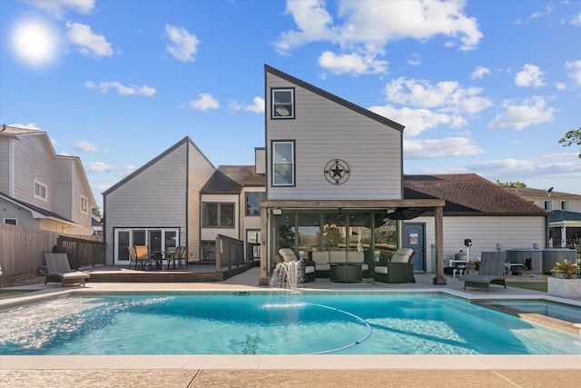 8307 Amber Cove Dr, Atascocita, TX 77346 - view of pool with an outdoor hangout area and a pool with connected hot tub