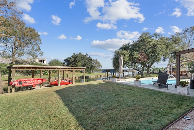 8307 Amber Cove Dr, Atascocita, TX 77346 - view of home's community with a yard and a pool