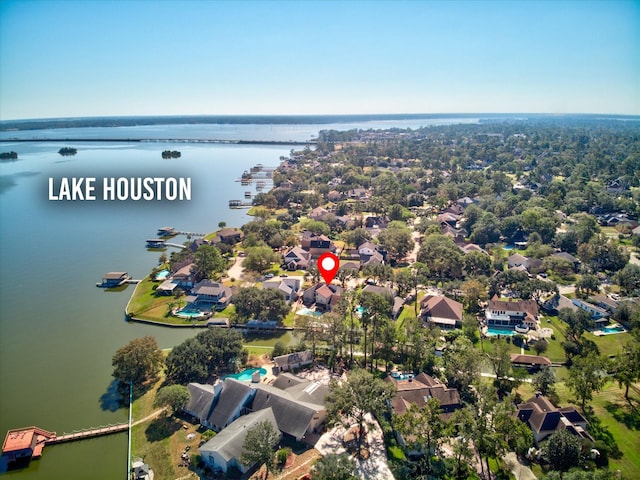8307 Amber Cove Dr, Atascocita, TX 77346 - aerial view of residential area featuring a large body of water