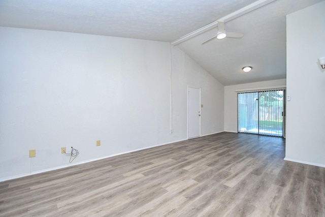 6915 Jeb Stuart Dr, Richmond, TX 77469 - empty room featuring ceiling fan, wood finished floors, and vaulted ceiling