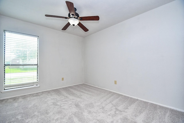 6915 Jeb Stuart Dr, Richmond, TX 77469 - empty room featuring plenty of natural light, carpet floors, and ceiling fan