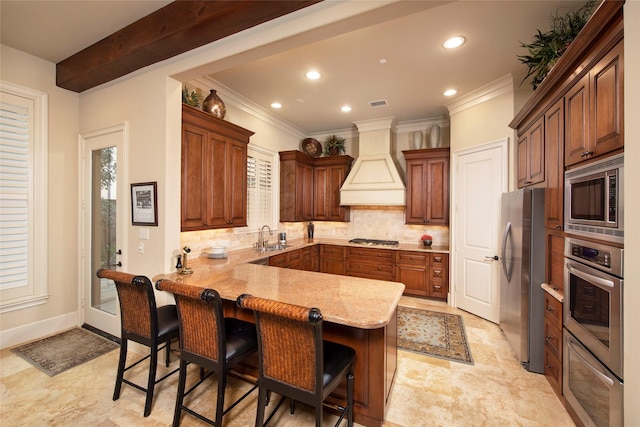 25 N Creekside Ct, Houston, TX 77055 - kitchen featuring custom exhaust hood, stainless steel appliances, a peninsula, a breakfast bar area, and backsplash