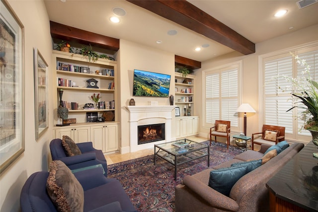 25 N Creekside Ct, Houston, TX 77055 - living area with built in features, beamed ceiling, recessed lighting, a lit fireplace, and plenty of natural light