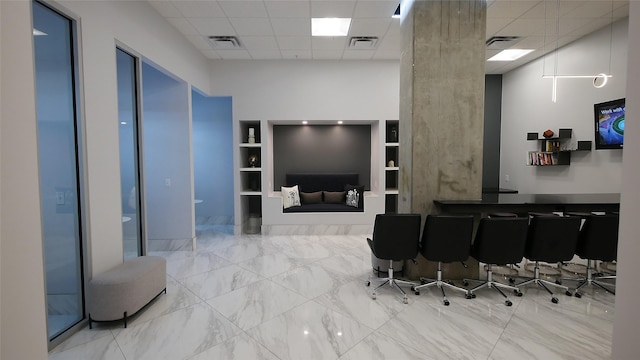 5925 Almeda Rd Unit 12113, Houston, TX 77004 - bar with a drop ceiling, a towering ceiling, and built in features
