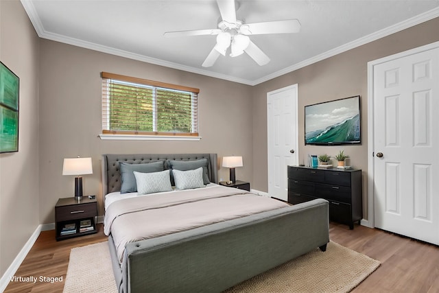 17427 Pinewood Forest Dr, Spring, TX 77379 - bedroom featuring light wood-type flooring, ornamental molding, and ceiling fan
