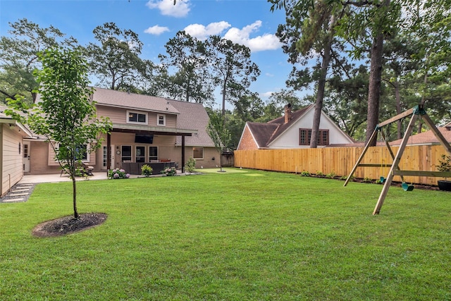 17427 Pinewood Forest Dr, Spring, TX 77379 - fenced backyard featuring a patio area and a playground