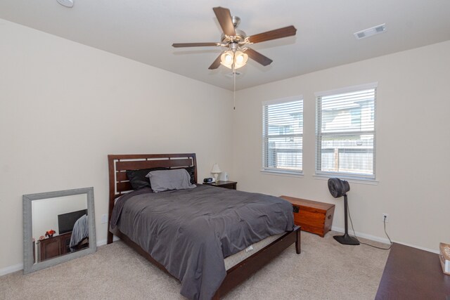 5529 Evanston Ln, Pasadena, TX 77505 - bedroom featuring light carpet and ceiling fan